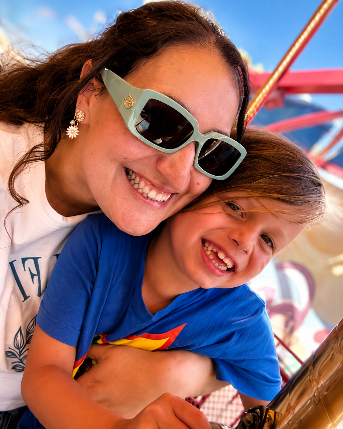 A smiling client and support professional enjoying a community attraction