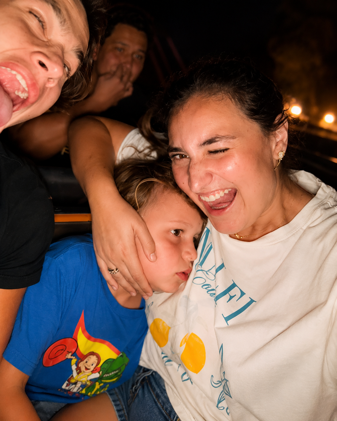 A joyful moment between clients and a support professional during an outing